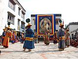 Mustang Lo Manthang Tiji Festival Day 1 06 Dorje Jono And Monks Perform Third Dance Dorje Jono and the monks wearing the colourful peacock-feather hats twirled and jumped during the third dance of the Tiji Festival in Lo Manthang. The first day of the Tiji Festival was colourful, but really, a bit boring, with only three long dances. If you have to skip one day of the Tiji, this would be the day.
